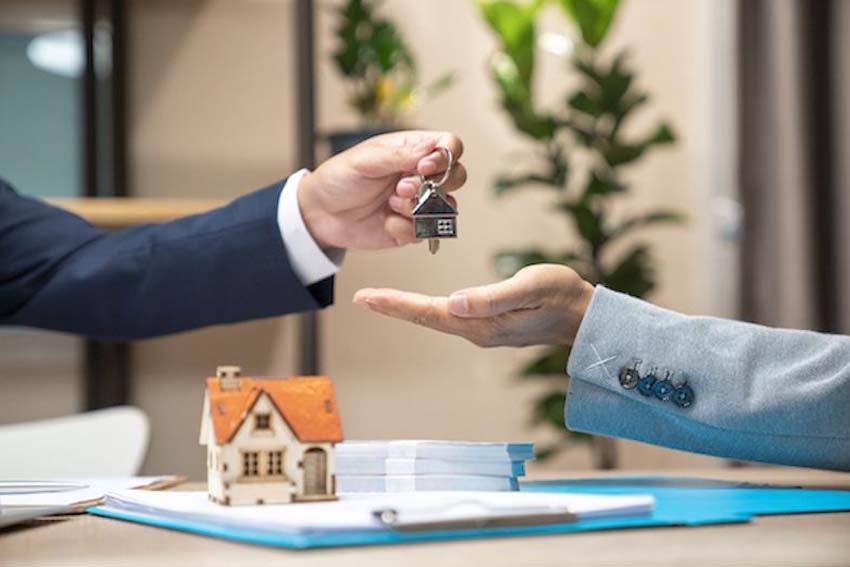 young couple buying a new house